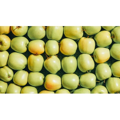 background with green fresh picked apples